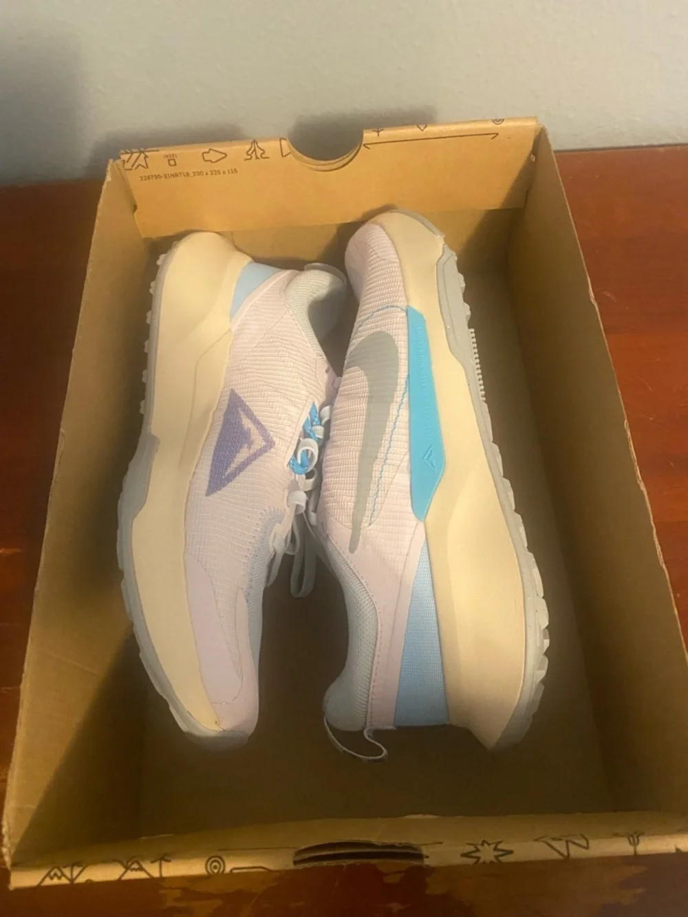 Nike WMNS Juniper Trail 2 in Pearl Pink and Blue
